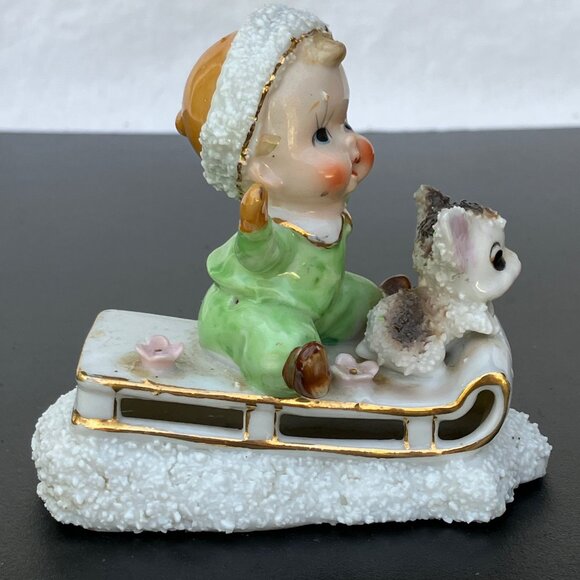 UCAGCO Japan Porcelain Sugared Sledding Boy with Puppy Figurine - Picture 6 of 12